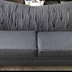 Tufted Blue sofa 