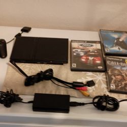 PS2 Slim Version w/ 2) Controllers & 5) Games *Adult Owned*