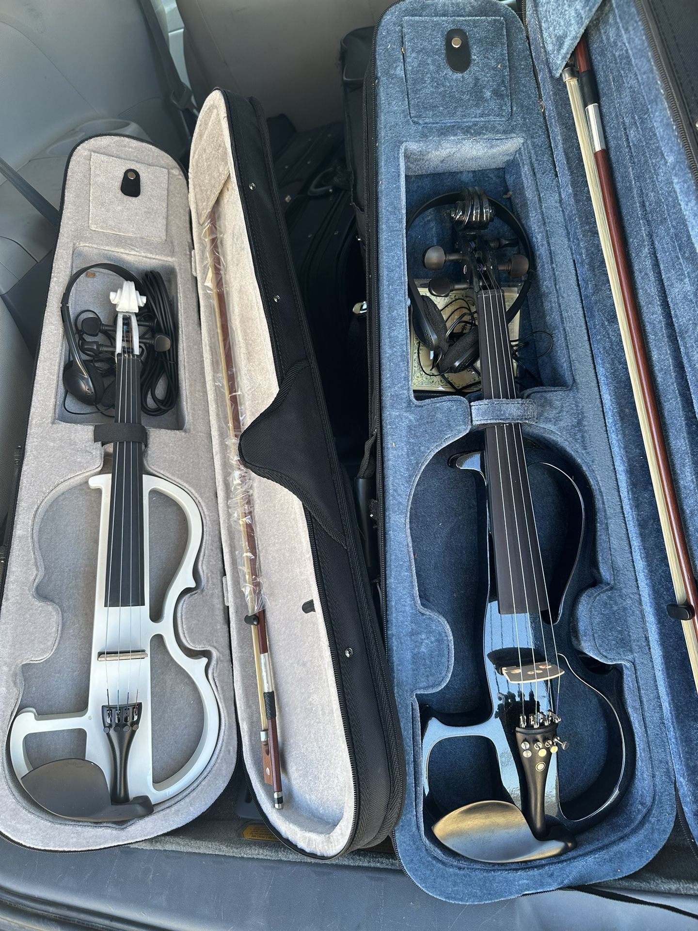 White and Black Electric Violins $160 Each Firm