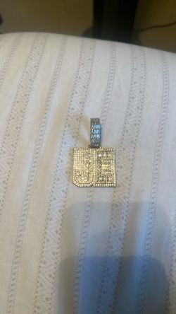 JE diamond pendant plated with silver
