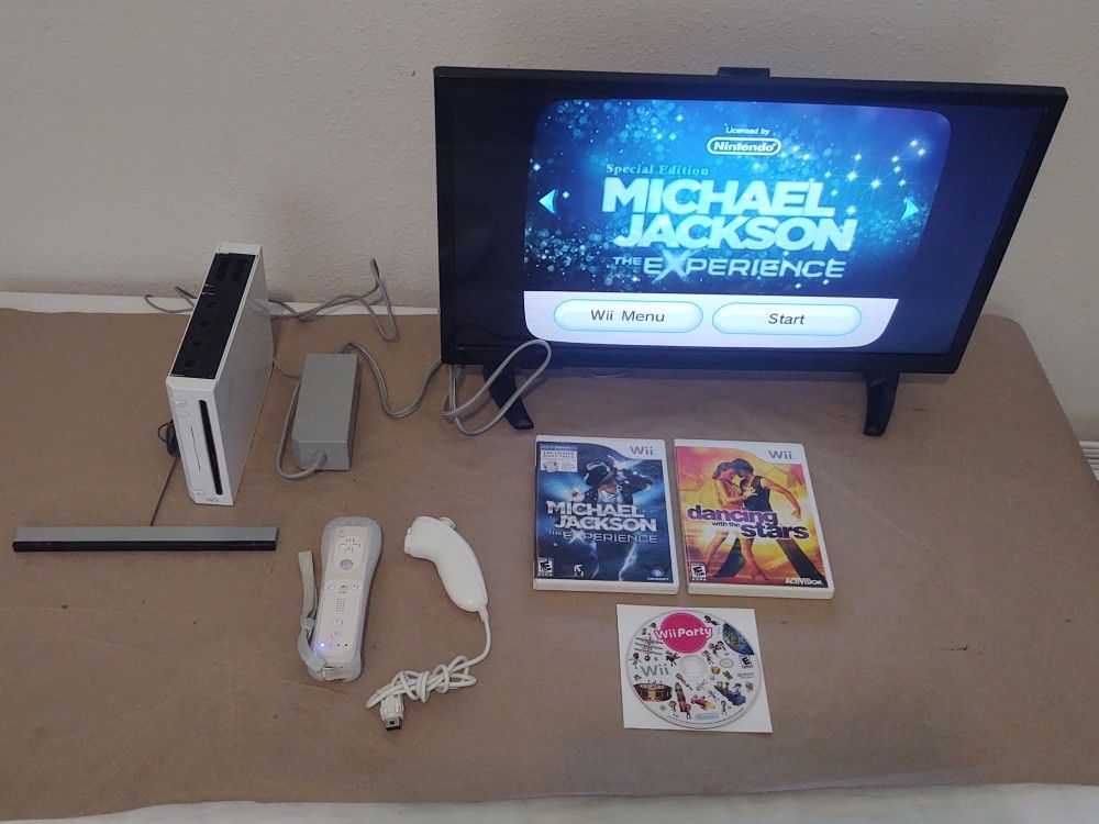 Nintendo Wii Bundle with Remote and Games - READ