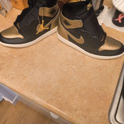 Brand new air Jordan gold and black 11 1/2 men's size 