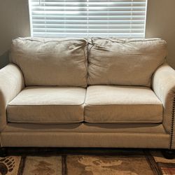 used sofa and love seat, cream color