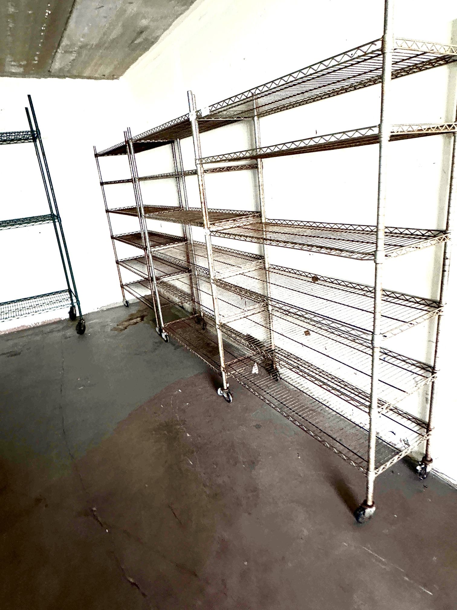 Commercial Grade Shelving 2 Complete, Assembled Metro Racks, 6 Shelves Each With Wheels