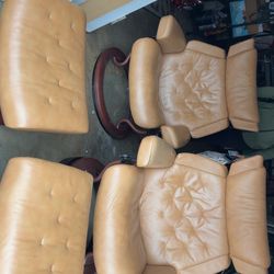 Two recliners with foot rests