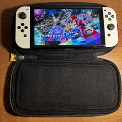 Nintendo Switch OLED White Edition with Mario Kart 8 Deluxe Game 