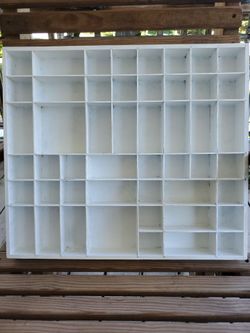 Vintage wooden trinket display shelf