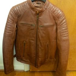 Tan leather jacket.