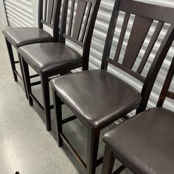 dark wood counter-height set. Size Chair  24” H 