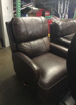 Rocking leather recliner chair