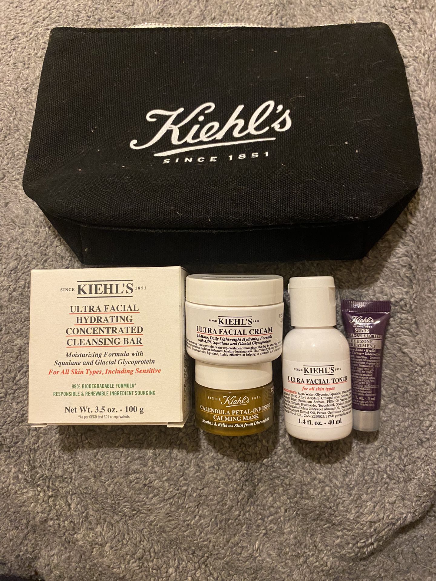 Kiehl’s Black Bag, Ultra Facial Hydrating Concentrated Cleansing Bar, Ultra Facial Cream, Calendula Calming Mask, Ultra Facial Toner& Super Multi Eye