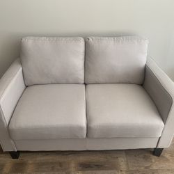 Light gray sofa couch loveseat (W55, D31, H35) Almost new, no stains or dings. Pick Up Near Millennium Park. Easy to clean fabric.