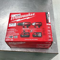 Milwaukee 2 Pc Cordless Combo 2 Batteries And Charger And Bag