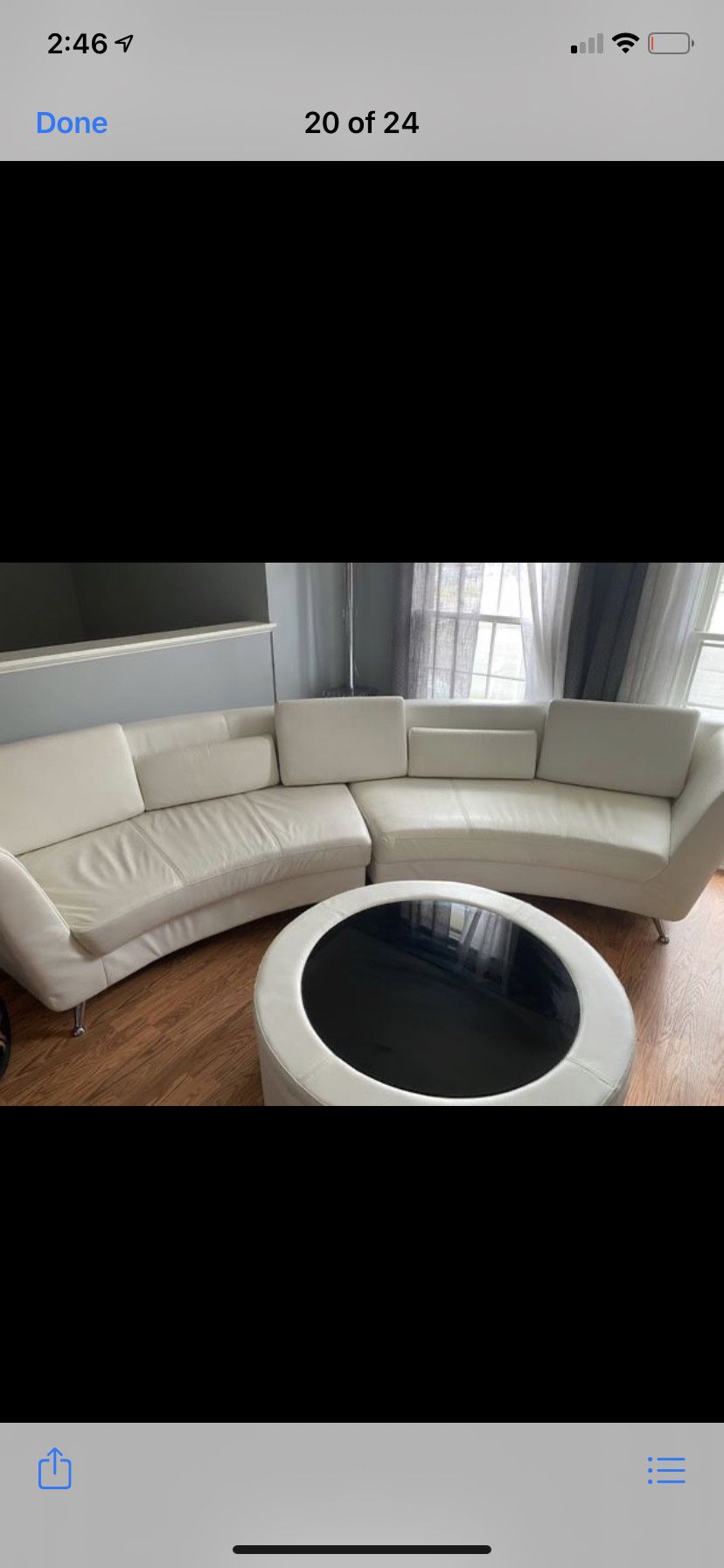 White leather sectional matching coffee table and TV stand