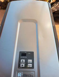 RINNAI R94 LS NON CONDENSING TANKLESS WATER HEATER.