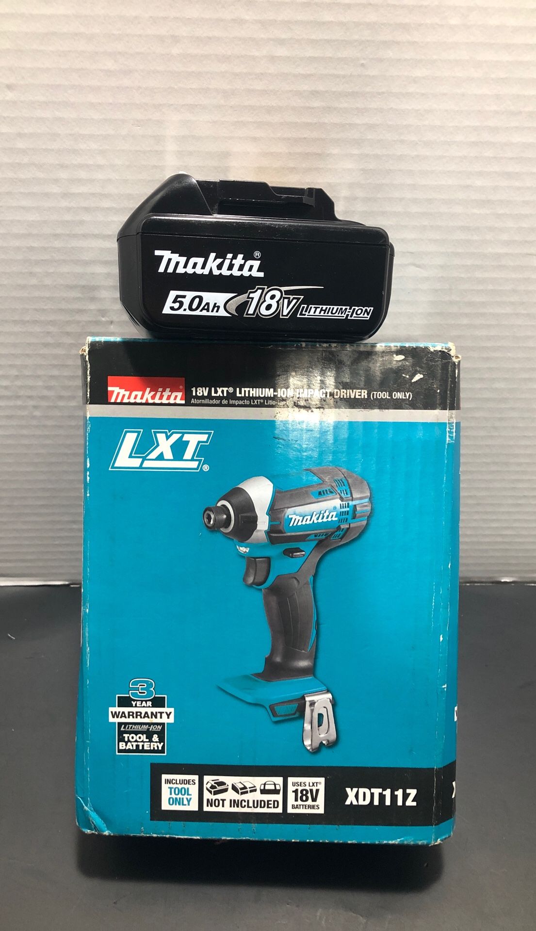 Makita 18-Volt LXT Lithium-Ion 1/4 in. Cordless Impact Driver (Tool-Only New)+Battery 5.0Ah-Used