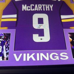 Vickings OB McCarthy signed Jersey with revert certificate sticker on the number