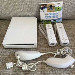 Nintendo Wii Bundle W/ Wii Sports + 2 controllers / Numchucks 