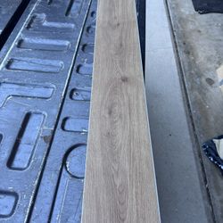 FLOORING 9 boxes (8 unopened) brand new Lux Chestnut 7inch planks