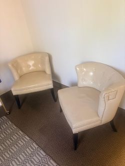 2 Cream leather chairs