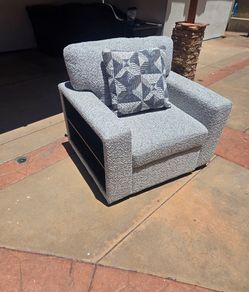 Sofa chair with built in ottoman
