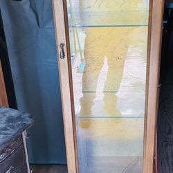 Pretty cabinet it’s  66 inches tall 15 nches wide and 11 inches deep