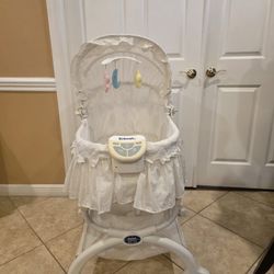 Kolcraft Light Vibes Rocking Bassinet