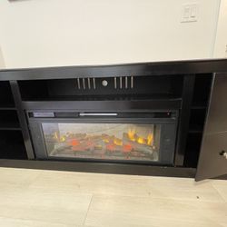 72” T V Stand with Electric  Fireplace and  built-in heater and speakers! 