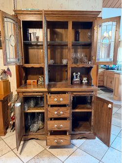Solid oak table , serving cart, hutch & six chairs