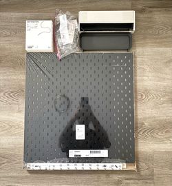 Black IKEA Pegboard with accessories