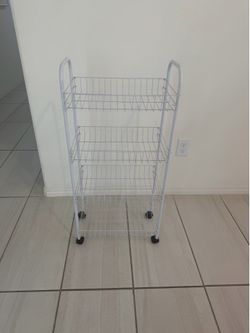 Four tier rolling storage cart