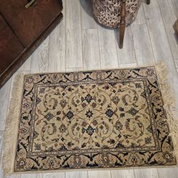 Hand knotted medallion wool small rug