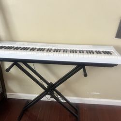 Yamaha electric piano with stand