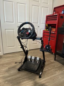 Logitech G29 Racing Wheel with Stand, pedals, and Handbrake