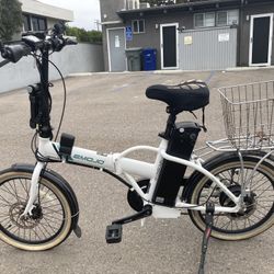 Emojo E-bike.. In great shape..includes helmet,lock, mirror,light, soft seat, basket and phone holder. $600