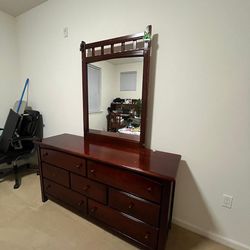 Dresser with cabinets and mirror