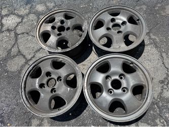 Four Black Honda 15 inch wheels 4 lugs