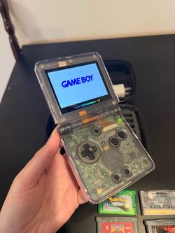Gameboy Advance SP w/ Extras and games