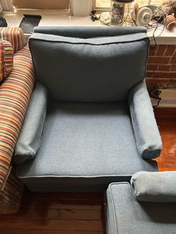 Two Blue Sofa Chairs