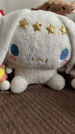 a white Sanrio Cinnamoroll plush backpack