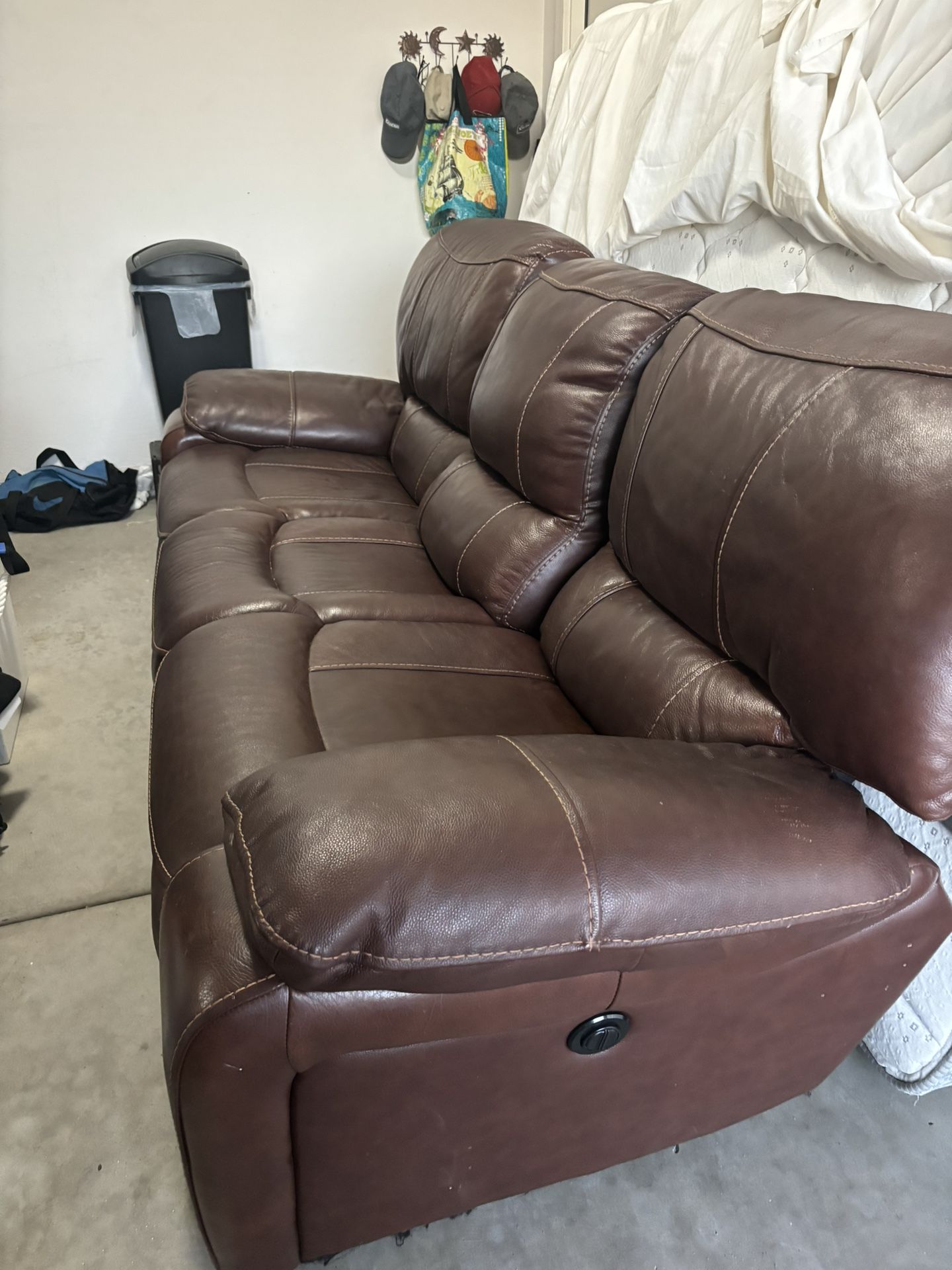 REDUCED TO SELL: All Leather Sofa With 2 Electric Recliners