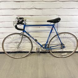 Blue Peugeot Bike
