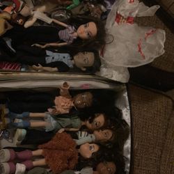 13 Bratz Dolls plus misc accessories