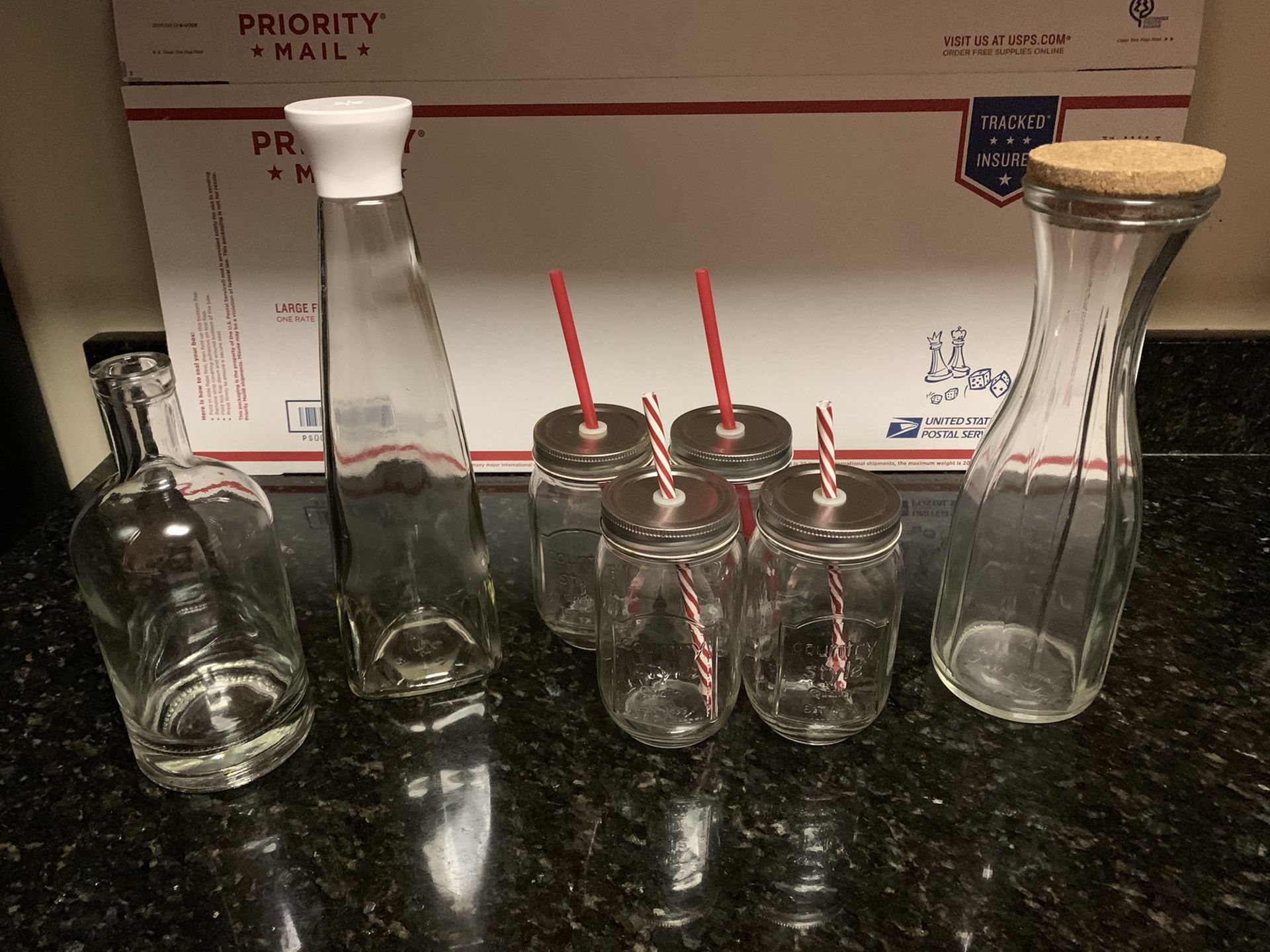 Lot of 7: Four Mason Jar Glasses with Tin Lids and Plastic Straws, 2 Glass Carafes, and 1 Glass Decanter