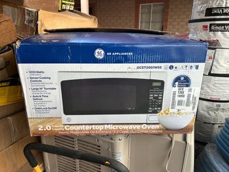 New GE 2.0 cu. ft. 1200-Watt Countertop Microwave