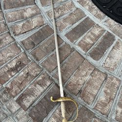 34” Toledo Spain Sword. Fair condition. Rust on blade. Chipped Handle 