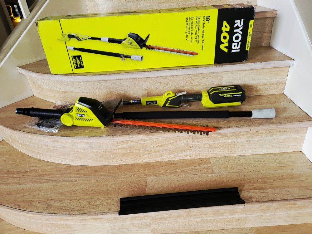 Ryob brand new 18 in. Cordless Battery Pole Hedge Trimmer with (1)4ah Battery/charger(extens up 8')