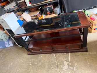 Glass and wood centerpiece living room table