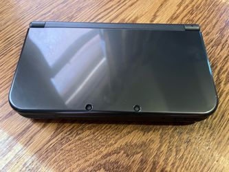 New Nintendo 3ds XL Grey + One Game