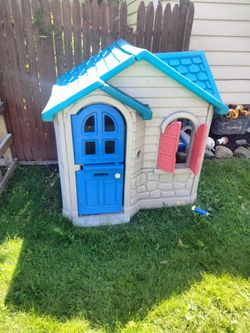 Kids playhopuse screwed together so it can be moved around the yard